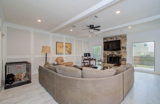 5422 Windy Lake Dr, Houston, TX 77345 - living area featuring ornamental molding, a fireplace, a decorative wall, a ceiling fan, and recessed lighting