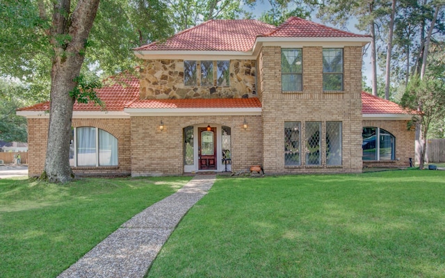 5422 Windy Lake Dr, Houston, TX 77345 - mediterranean / spanish home featuring a tiled roof