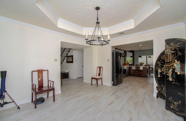 5422 Windy Lake Dr, Houston, TX 77345 - interior space with a tray ceiling, a chandelier, stairway, and ornamental molding