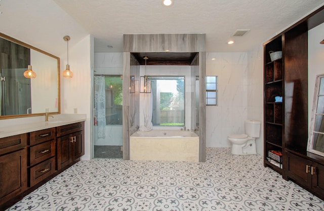 5422 Windy Lake Dr, Houston, TX 77345 - full bath with a bath, vanity, a shower stall, and a textured ceiling