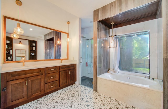 5422 Windy Lake Dr, Houston, TX 77345 - full bathroom featuring a garden tub, a stall shower, and double vanity