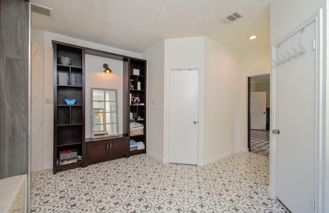 5422 Windy Lake Dr, Houston, TX 77345 - hall with a textured ceiling and recessed lighting