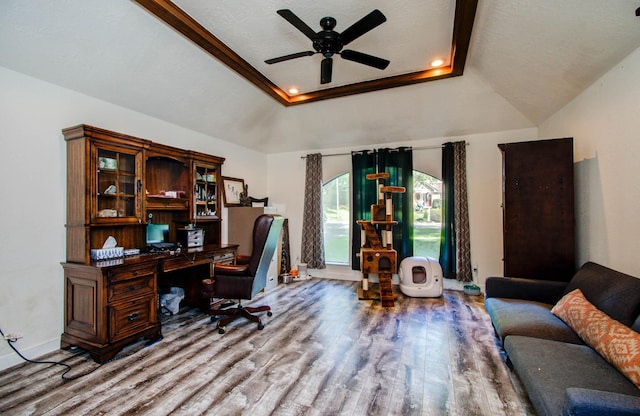 5422 Windy Lake Dr, Houston, TX 77345 - office with wood finished floors, ceiling fan, and a raised ceiling