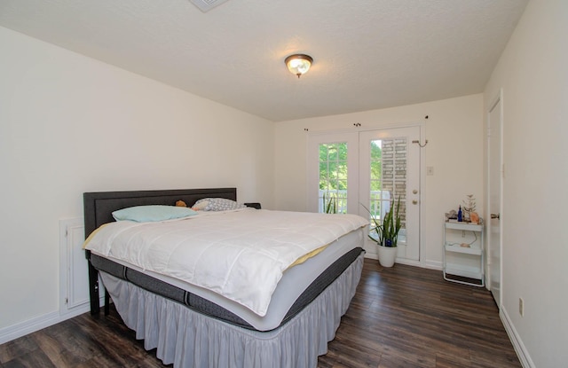 5422 Windy Lake Dr, Houston, TX 77345 - bedroom with access to exterior and dark wood-type flooring