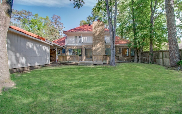 5422 Windy Lake Dr, Houston, TX 77345 - back of property with a balcony, a chimney, and brick siding