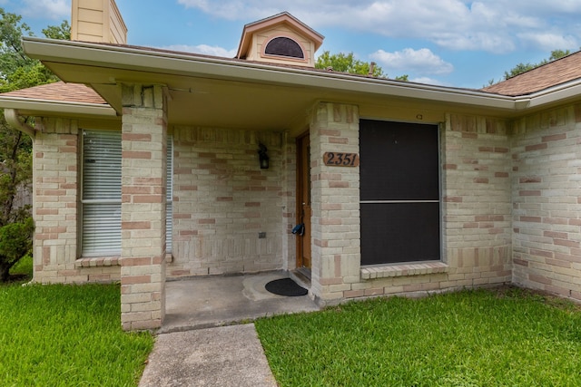 2351 Loyanne Dr, Spring, TX 77373 - doorway to property with roof with shingles and brick siding