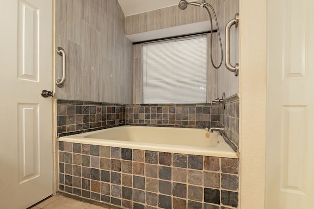 2351 Loyanne Dr, Spring, TX 77373 - bathroom featuring tile patterned floors and tiled shower / bath combo
