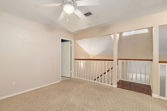 2351 Loyanne Dr, Spring, TX 77373 - empty room with vaulted ceiling, carpet floors, a ceiling fan, and a smoke detector