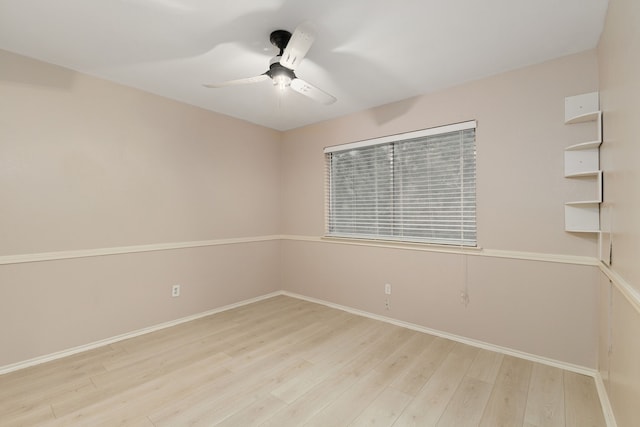 2351 Loyanne Dr, Spring, TX 77373 - spare room featuring wood finished floors and a ceiling fan