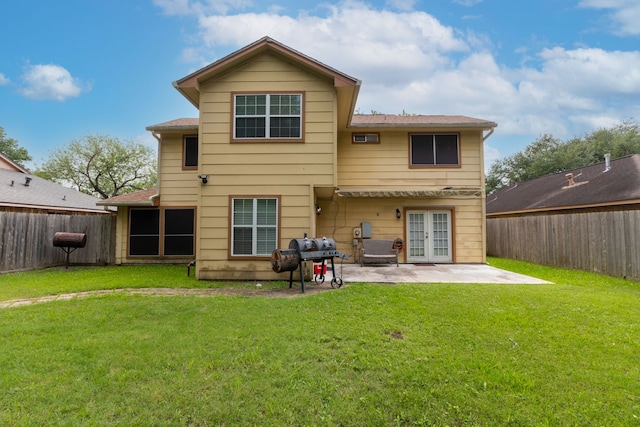 2351 Loyanne Dr, Spring, TX 77373 - back of house with french doors, a patio, a fenced backyard, and roof with shingles