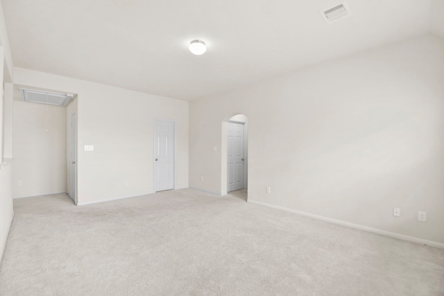 15107 Sequoia Meadow Ct, Humble, TX 77346 - unfurnished room featuring attic access, light colored carpet, and arched walkways
