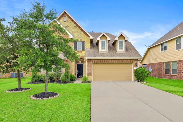 15107 Sequoia Meadow Ct, Humble, TX 77346 - view of front of house with driveway, a shingled roof, a front lawn, and brick siding
