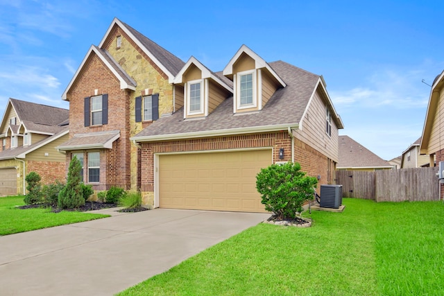 15107 Sequoia Meadow Ct, Humble, TX 77346 - view of front of house featuring brick siding, driveway, a shingled roof, a garage, and stone siding