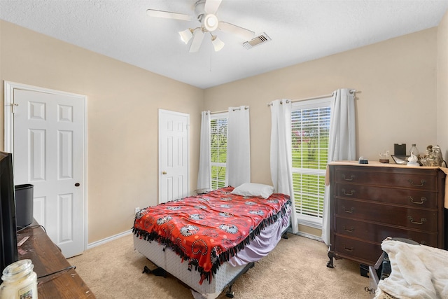 3357 Tamy Ln, Brenham, TX 77833 - bedroom featuring light carpet and a ceiling fan