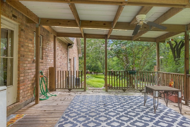 3357 Tamy Ln, Brenham, TX 77833 - wooden deck with a ceiling fan and view of scattered trees