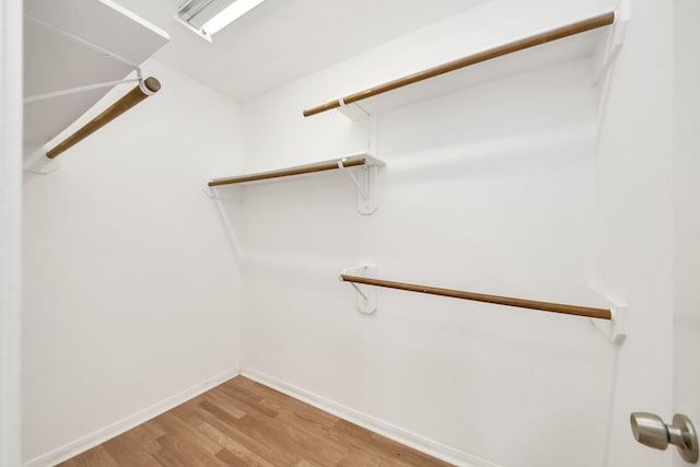 9410 Gatmere Ct, Sugar Land, TX 77498 - spacious closet with light wood finished floors