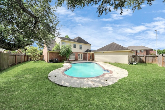 9410 Gatmere Ct, Sugar Land, TX 77498 - view of swimming pool with a fenced backyard and french doors
