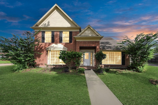 9410 Gatmere Ct, Sugar Land, TX 77498 - view of front of property with brick siding and a front yard