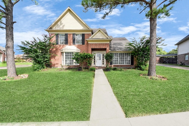 9410 Gatmere Ct, Sugar Land, TX 77498 - view of front of property with brick siding and a front yard