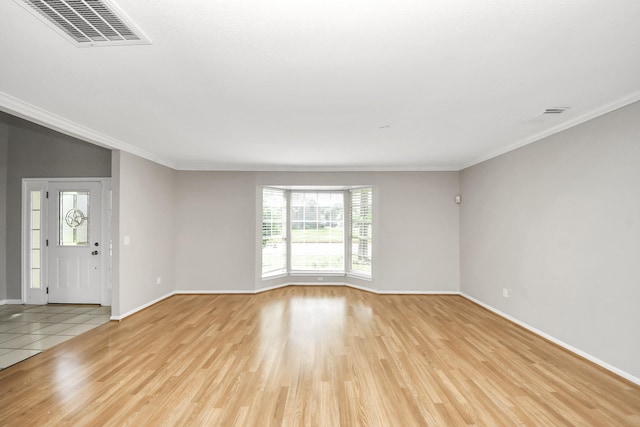 9410 Gatmere Ct, Sugar Land, TX 77498 - spare room featuring light wood finished floors and ornamental molding