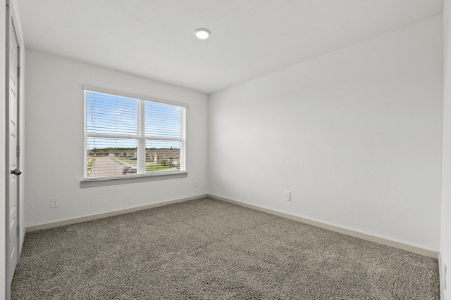 207 William Ln, Rosharon, TX 77583 - empty room featuring carpet floors and baseboards