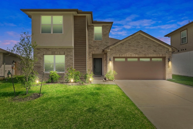 207 William Ln, Rosharon, TX 77583 - view of front of property featuring brick siding, driveway, an attached garage, and a front lawn