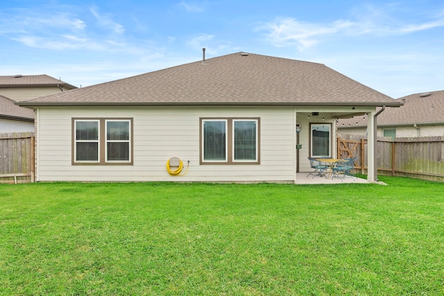 207 William Ln, Rosharon, TX 77583 - rear view of property featuring a fenced backyard, a patio area, and roof with shingles