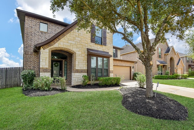 4615 Montcliff Bend Ln, Sugar Land, TX 77479 - french provincial home with stone siding, concrete driveway, and brick siding
