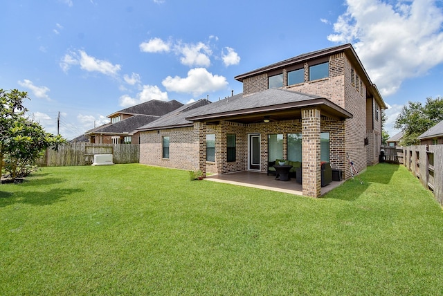 4615 Montcliff Bend Ln, Sugar Land, TX 77479 - rear view of house featuring brick siding, a patio, a fenced backyard, and ceiling fan
