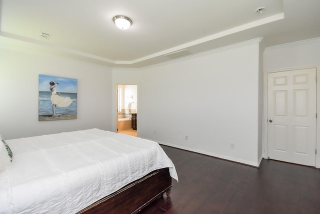 4615 Montcliff Bend Ln, Sugar Land, TX 77479 - bedroom featuring a raised ceiling and dark wood-type flooring