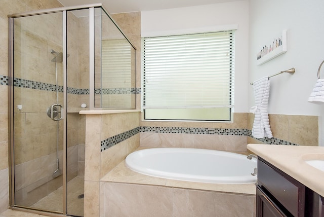 4615 Montcliff Bend Ln, Sugar Land, TX 77479 - full bath with a garden tub, healthy amount of natural light, and a shower stall