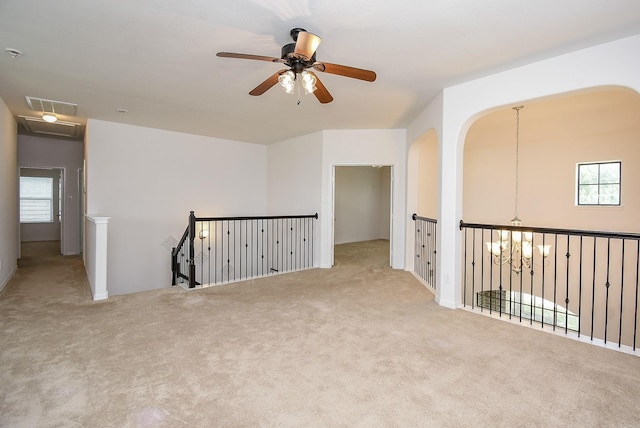 4615 Montcliff Bend Ln, Sugar Land, TX 77479 - carpeted empty room featuring attic access, ceiling fan, and healthy amount of natural light