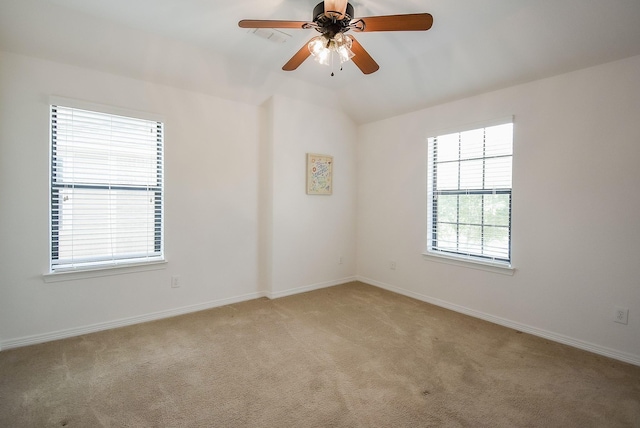 4615 Montcliff Bend Ln, Sugar Land, TX 77479 - spare room featuring light carpet, a ceiling fan, and vaulted ceiling