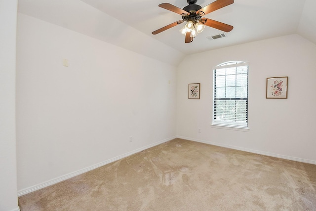 4615 Montcliff Bend Ln, Sugar Land, TX 77479 - spare room with vaulted ceiling, light colored carpet, and ceiling fan