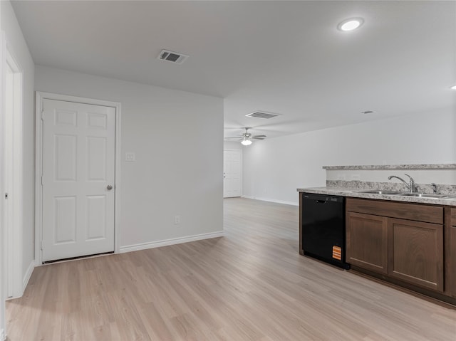 312 N Orange St, Sweeny, TX 77480 - kitchen featuring dishwasher, light wood finished floors, ceiling fan, and light stone counters