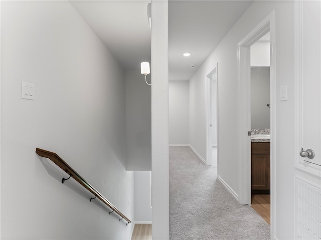 312 N Orange St, Sweeny, TX 77480 - hall featuring light colored carpet and an upstairs landing