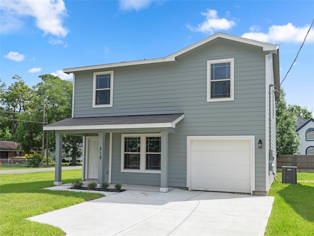 312 N Orange St, Sweeny, TX 77480 - traditional-style home with a garage, a porch, and concrete driveway