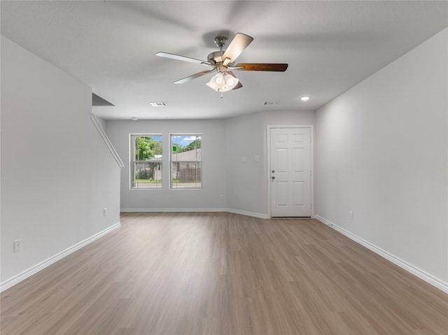 312 N Orange St, Sweeny, TX 77480 - empty room with light wood finished floors and ceiling fan
