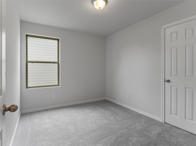 312 N Orange St, Sweeny, TX 77480 - carpeted empty room featuring baseboards