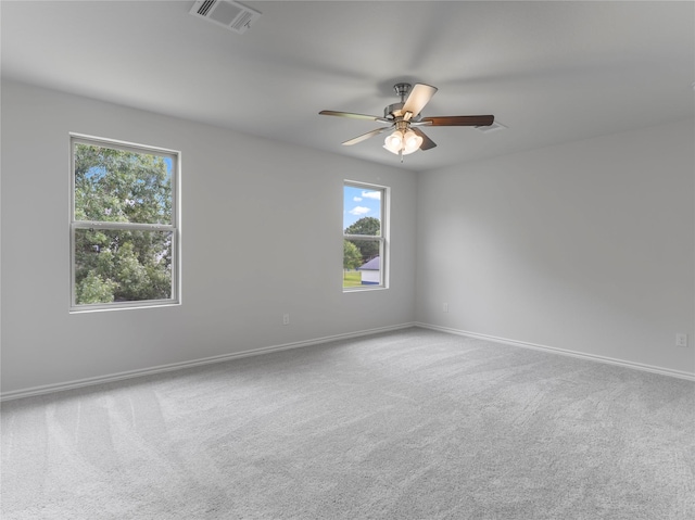 312 N Orange St, Sweeny, TX 77480 - carpeted empty room featuring plenty of natural light and ceiling fan