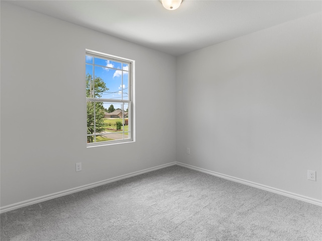 312 N Orange St, Sweeny, TX 77480 - carpeted spare room featuring baseboards