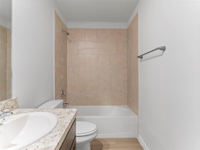 312 N Orange St, Sweeny, TX 77480 - full bath featuring vanity, shower / bath combination, and wood finished floors