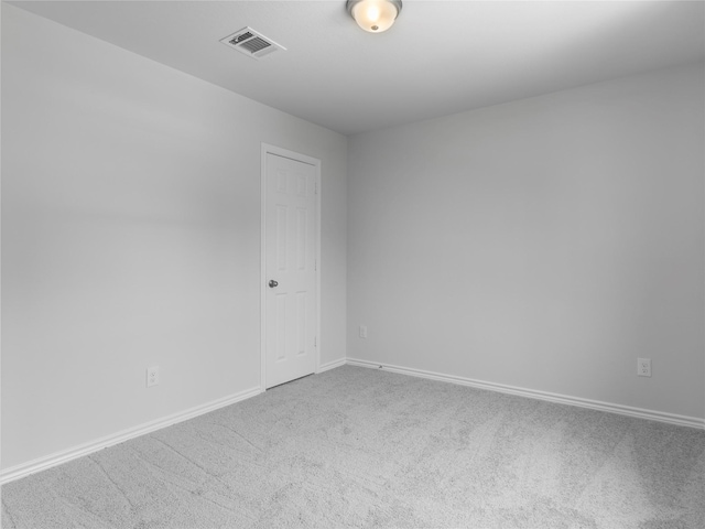 312 N Orange St, Sweeny, TX 77480 - spare room featuring carpet floors and baseboards