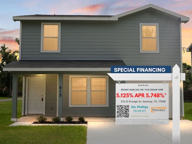 312 N Orange St, Sweeny, TX 77480 - view of front facade featuring covered porch and a front yard