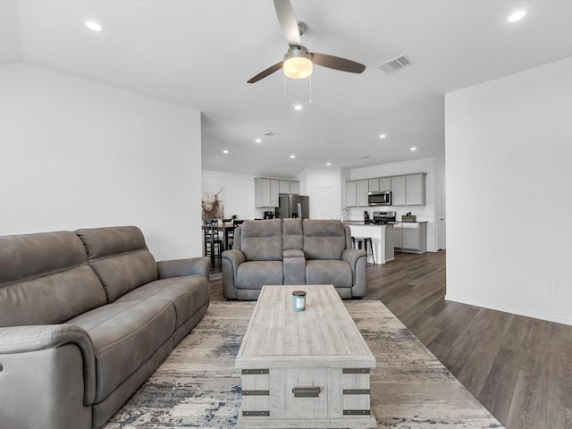 17831 Sommerset Falls Ln, Crosby, TX 77532 - living room featuring a ceiling fan, wood finished floors, and recessed lighting