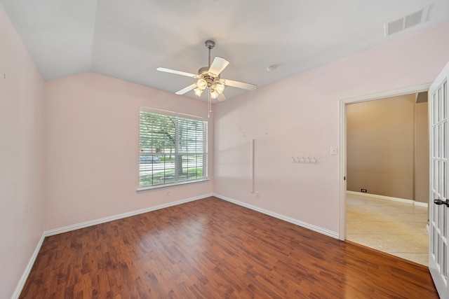 15015 Cozy Hollow Ln, Houston, TX 77044 - unfurnished room featuring wood finished floors, ceiling fan, lofted ceiling, and a smoke detector