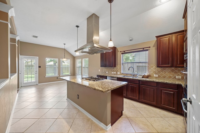 15015 Cozy Hollow Ln, Houston, TX 77044 - kitchen with extractor fan, vaulted ceiling, appliances with stainless steel finishes, light tile patterned floors, and a kitchen island