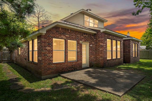 15015 Cozy Hollow Ln, Houston, TX 77044 - rear view of property featuring brick siding and a patio