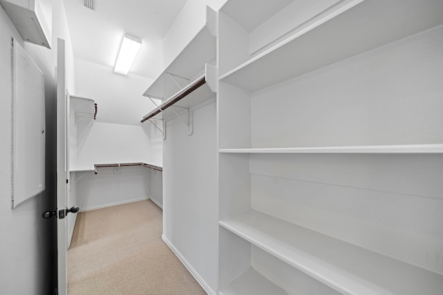 15015 Cozy Hollow Ln, Houston, TX 77044 - spacious closet featuring carpet flooring
