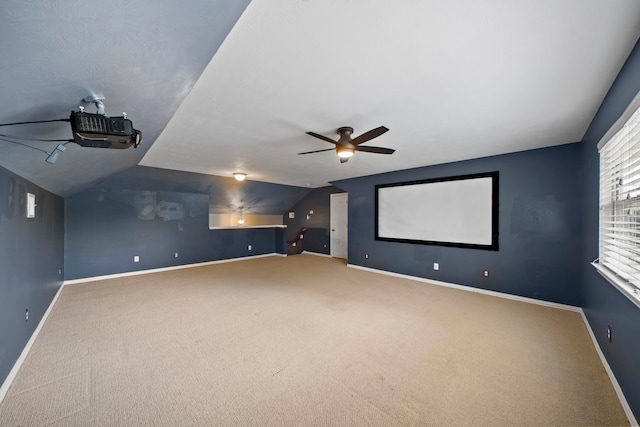 15015 Cozy Hollow Ln, Houston, TX 77044 - carpeted cinema with vaulted ceiling and ceiling fan